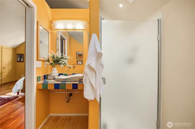 En suite 3/4 bath with skylight