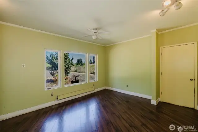 Big entry way room, rec room or 2nd living room, you choose. Front window looks out to driveway. Door leads to garage