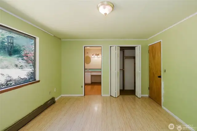 left to right- door to three quarter bath, then closet and on the right is the door to the hallway