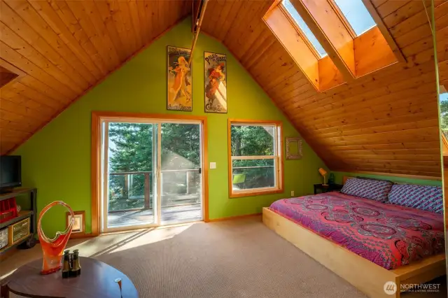 Master Bedroom with sliding doors leading to deck.