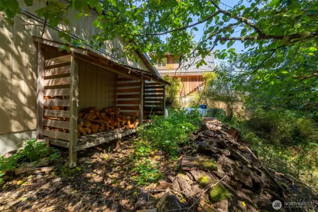 Rear of garage, wood storage.