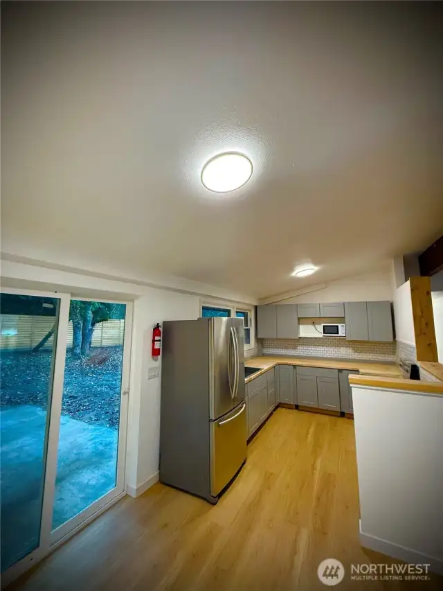 house kitchen and sliding glass door to yard