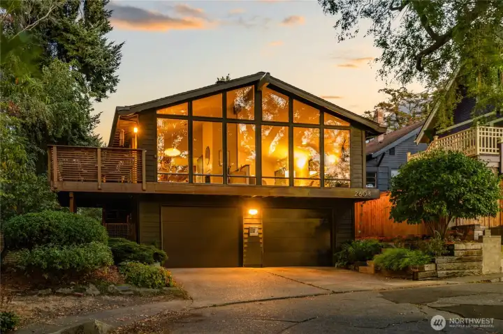 A home that feels both grounding and elevating—an architecturally crafted retreat where treetop privacy brings calm and inspiration in the heart of Queen Anne.