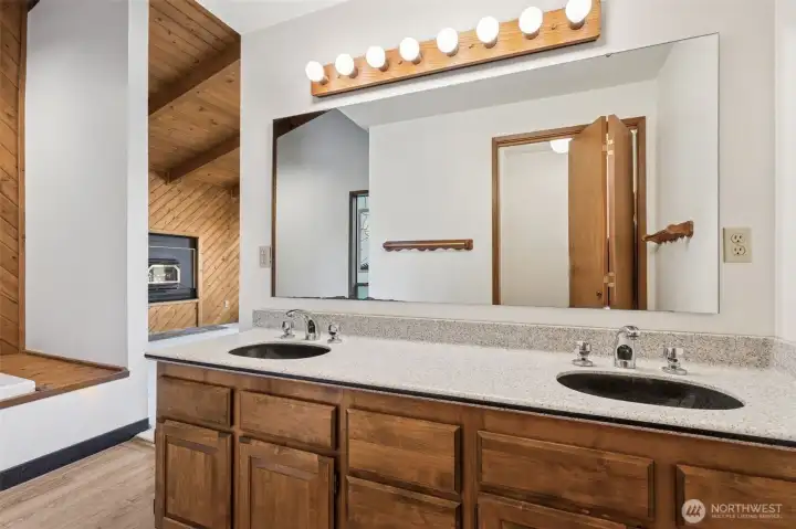 Master bathroom has stand alone shower and private toilet in its own little room