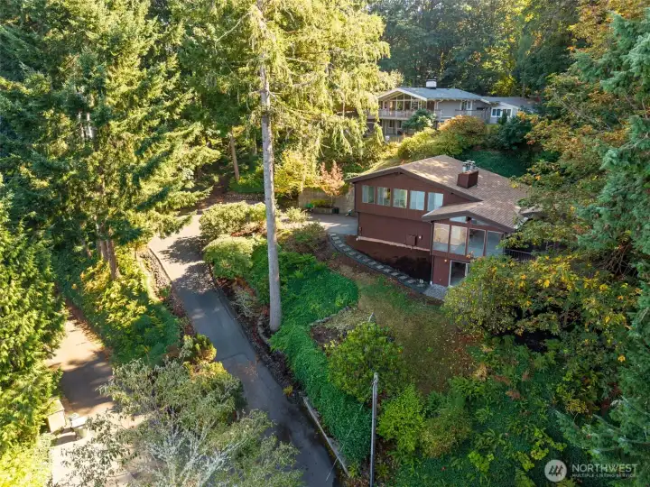 Up the driveway to your hidden gem of a home