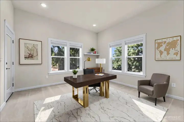 Virtually staged main level office with its own private door to deck.