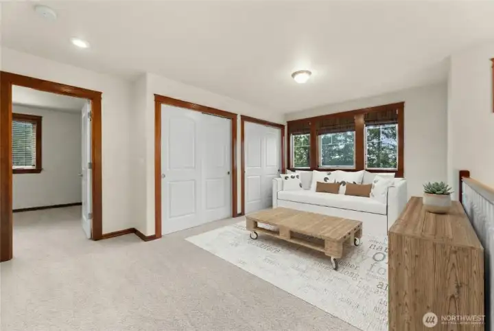 Virtually staged upstairs bonus room with lots of storage