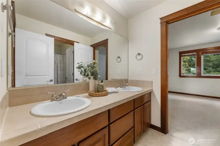 Nice size upstairs bathroom with dual sinks and separate shower/bath/toilet area