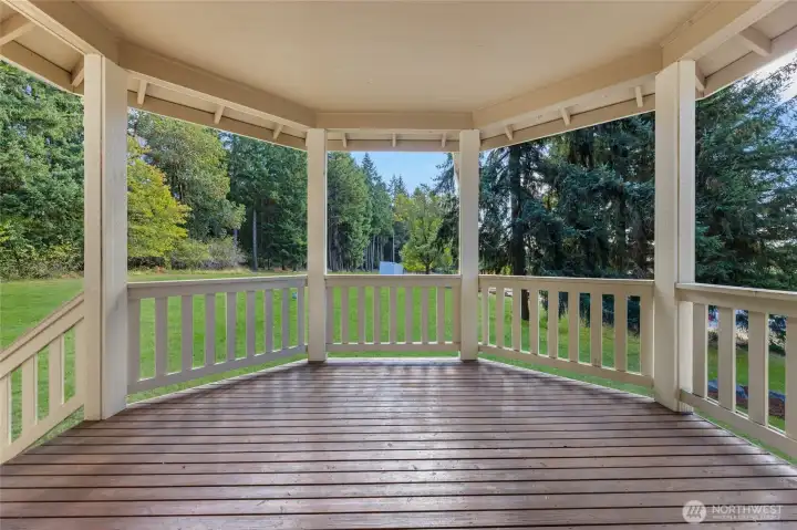 Deck on the side of the home right off the kitchen