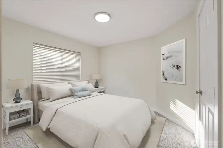 Comfortable and inviting guest bedroom with soft natural light, new carpet, and a neutral color palette ready to fit any style.