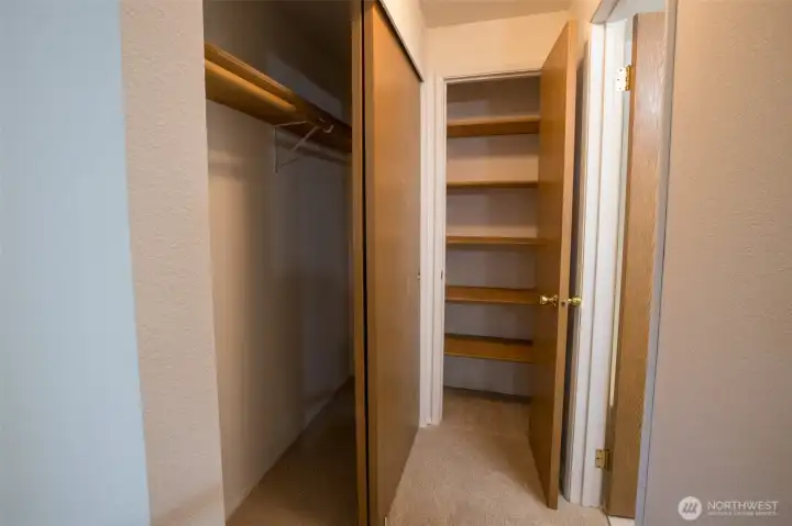 Closet and linen closet in Primary Upstairs