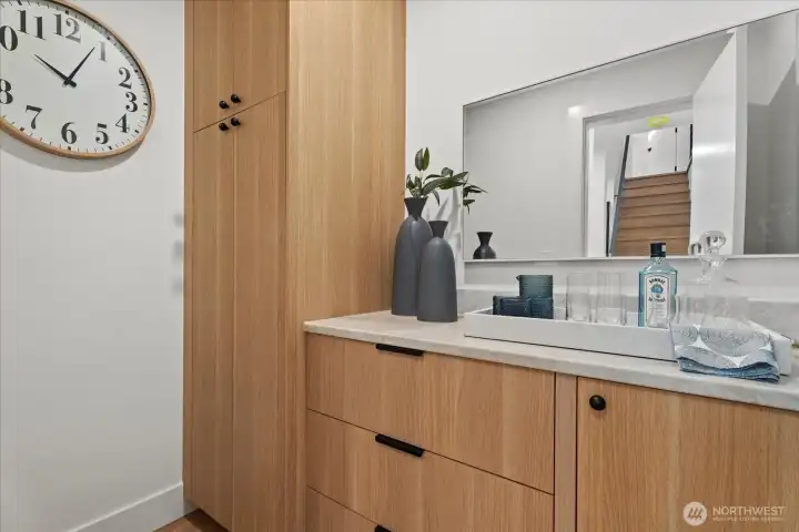 Dedicated pantry room.  Built in storage with quartzite countertops.
