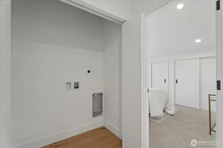 Laundry area, looking into 3rd upstairs bedroom on the right.