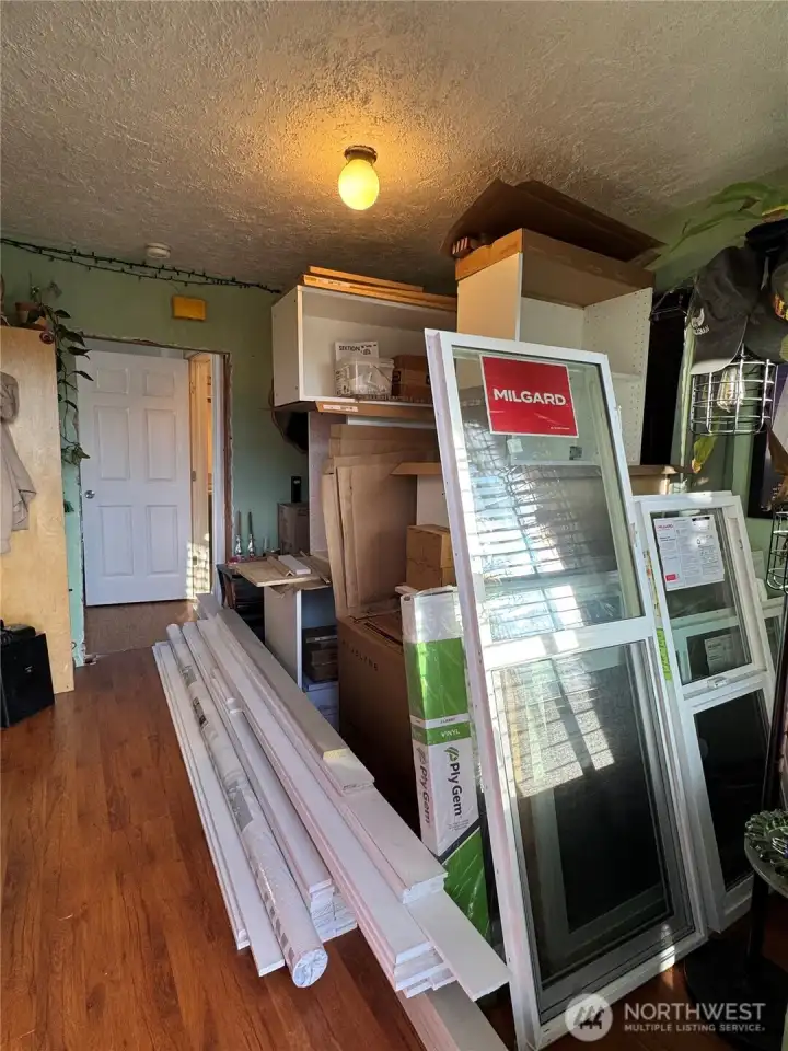 New kitchen cabinets, windows, and trim