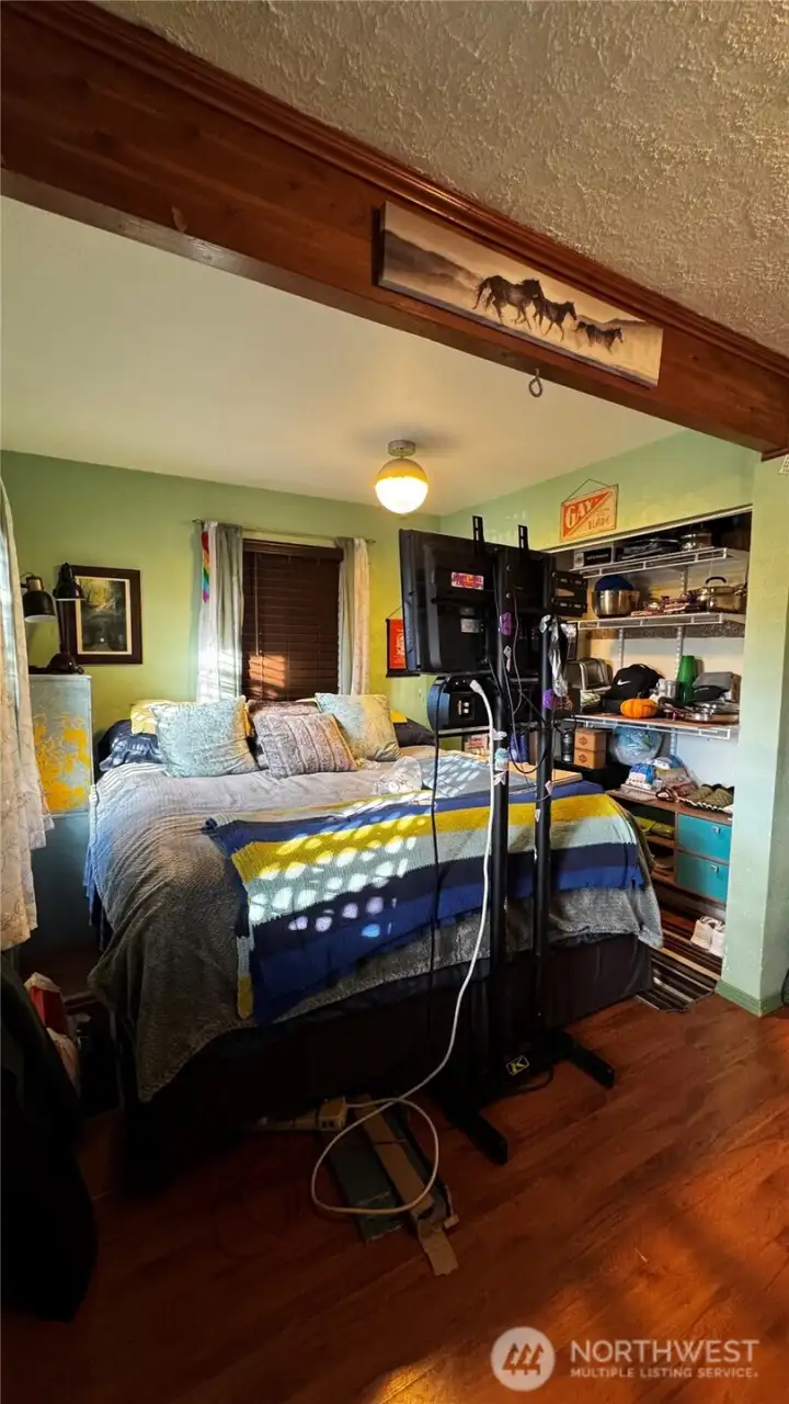 Living room area (Currently used as bedroom)