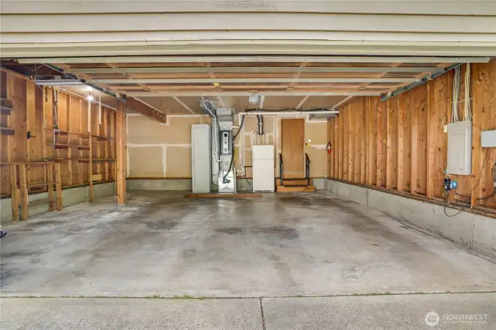 Very roomy 2-car garage allows you more storage and room for your larger vehicles.