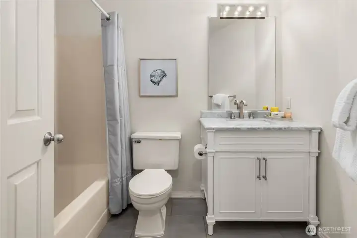 Lower-level full hall bathroom