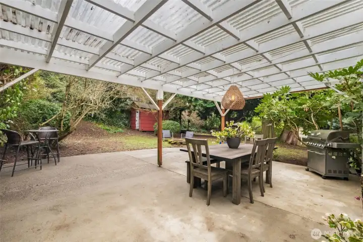 Spacious, covered patio looking out to the over 17000 sqft lot.