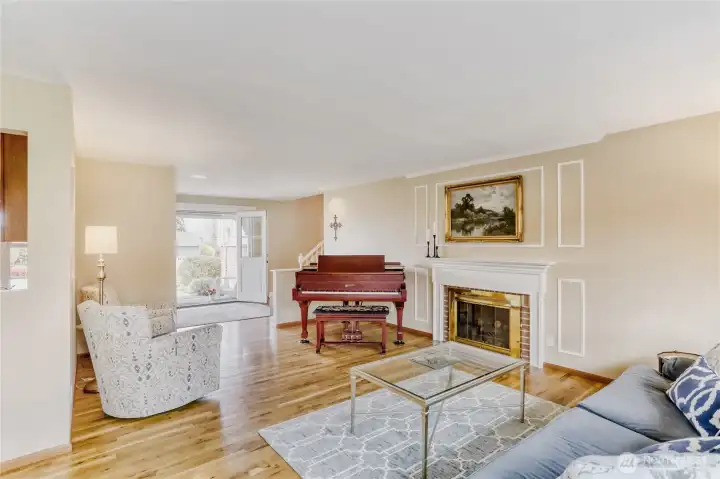 The formal living room is a refined setting for quiet evenings or gatherings.