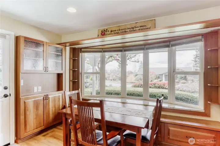 Charming bay window breakfast nook.