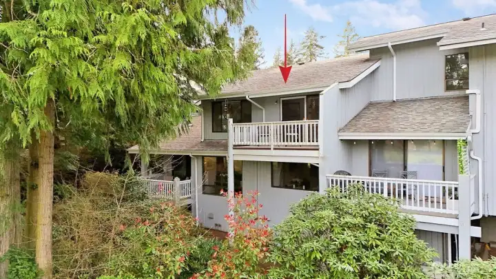 The top level unit offers really nice views overlooking the golf course. This building has four units, and there are a total of 38 units in the social community.