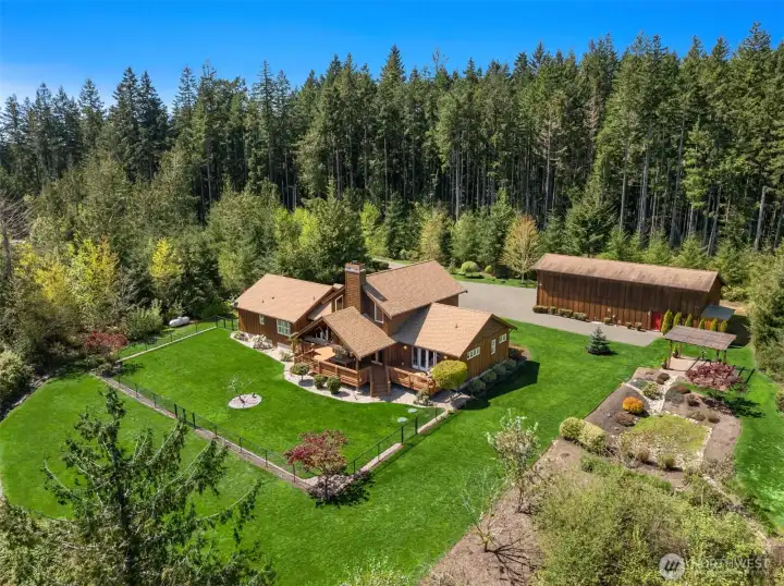 All that and a bag of chips! This stunning property is a rarely-seen treasure, combining privacy, a mountain view, essentially single-level living, abundant sunshine, and space for all your gear and toys. There is also room for expansion and/or an ADU, with an extra TWO bedrooms of septic capacity.