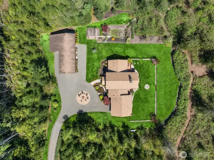 Here, an aerial of only the developed portion of the property, with the rest extending down the slope to the east (with a rough trail cut for the curious).