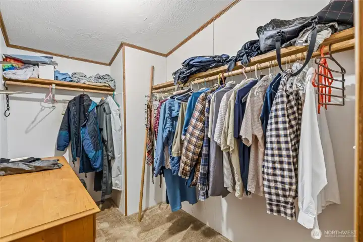 Primary walk-in closet.