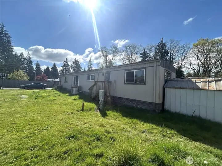 Plenty of grassy space to enjoy between units. Garden shed is also included.