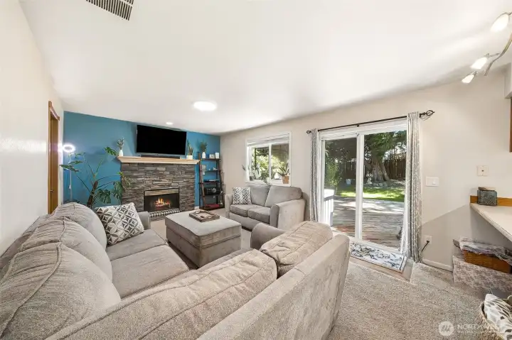 Family room with gas fireplace off kitchen