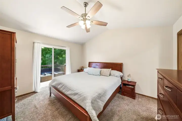 Primary bedroom with slider out to private deck