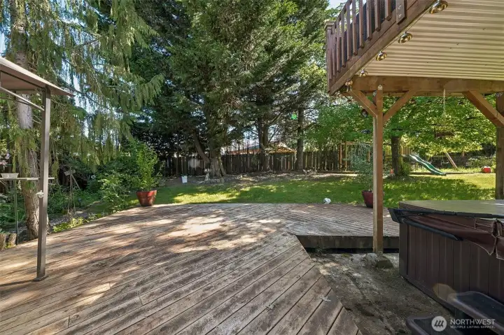 Gorgeous back yard with huge deck and hot tub