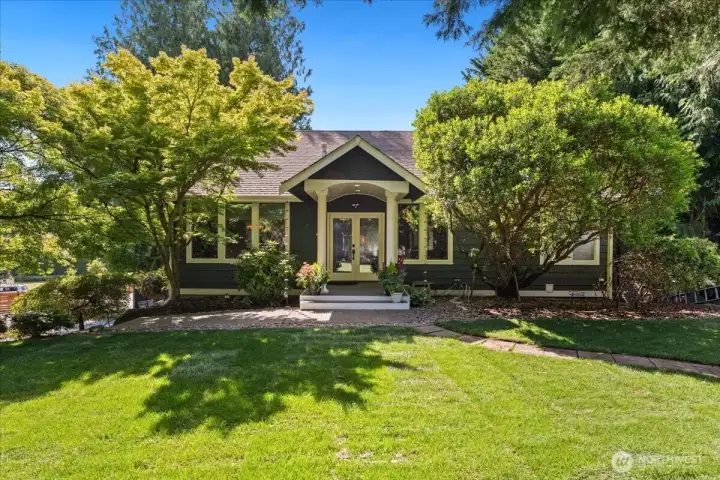 Beautifully maintained home situated on a private corner lot with fresh sod and sprinkler system.