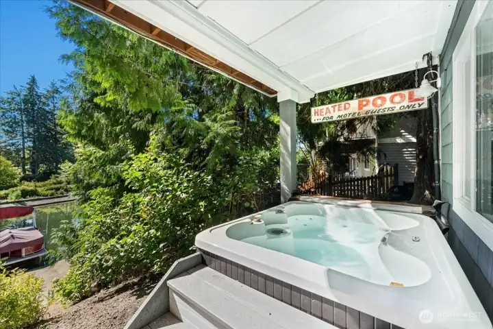 Unwind in your own hot tub on the lower patio while taking in breathtaking lake views and the tranquil waterfront setting.