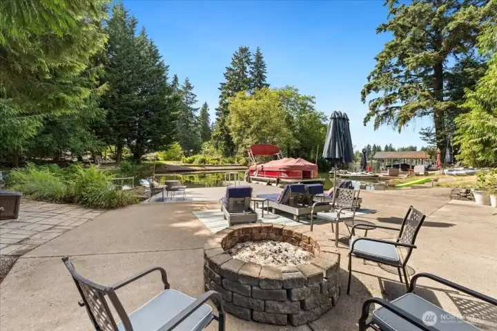Relax by your own built-in firepit and stunning views of the lake.