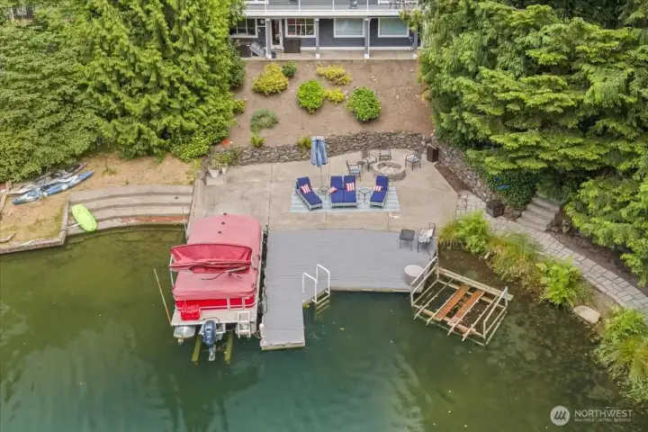 Enjoy the ultimate waterfront lifestyle with your own large private dock offering plenty of space for a pontoon boat and personal watercraft.