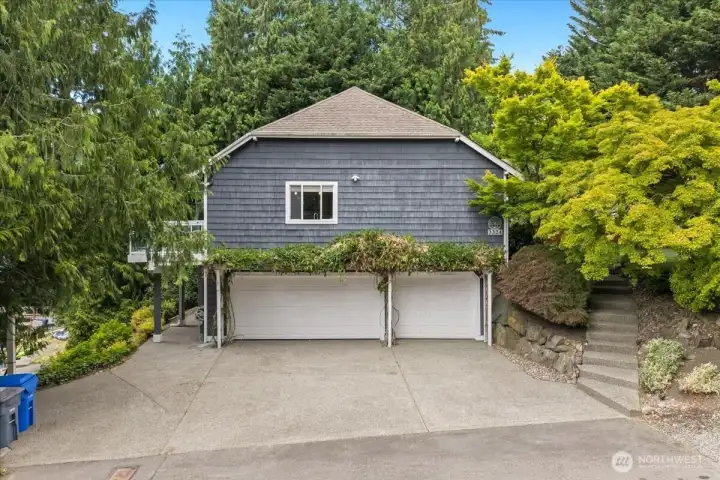 This home sits on a corner lot where you can access a coveted 3 car garage.