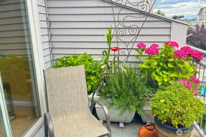 Who doesn't want a spot to capture some sunshine on a south facing deck like this one?