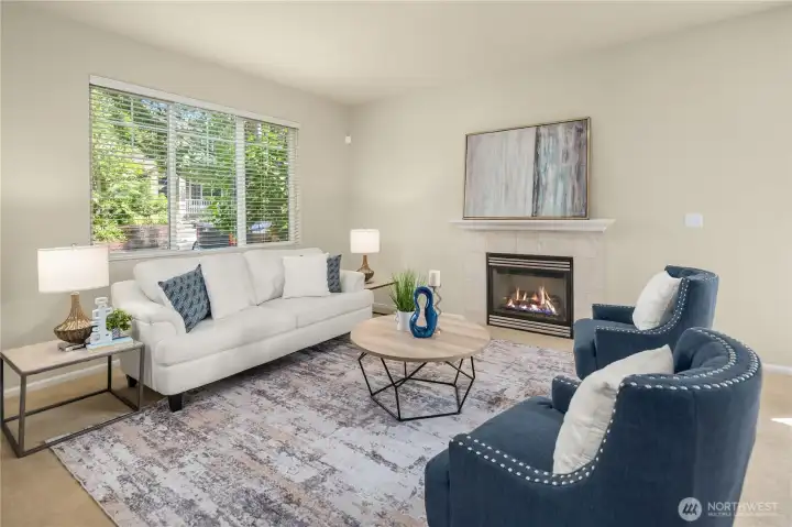 Living room with a charming built-in cozy gas fireplace