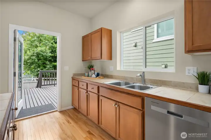 Kitchen opening up to the private deck