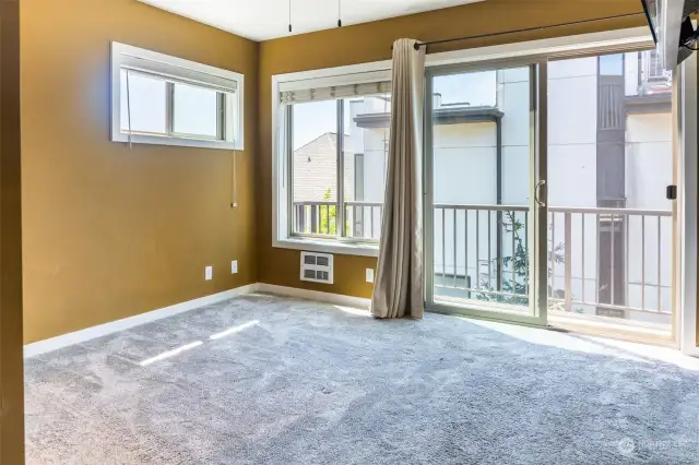 Primary bedroom with slider to private deck