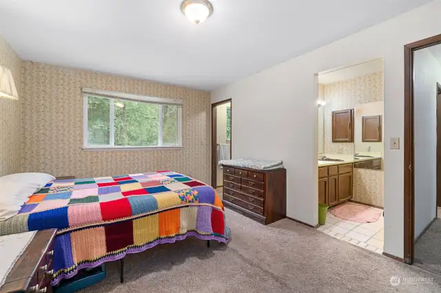 Primary Bedroom features a Unique Double Bath w/Toilet/Shower in one space .. Double Sinks in other