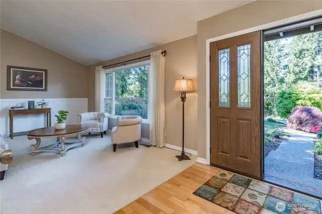 Double-door front entry opens to the formal living room