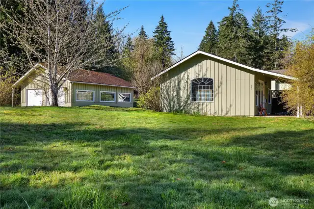 Looking at the main home garage on the left and studio apartment ont he right.