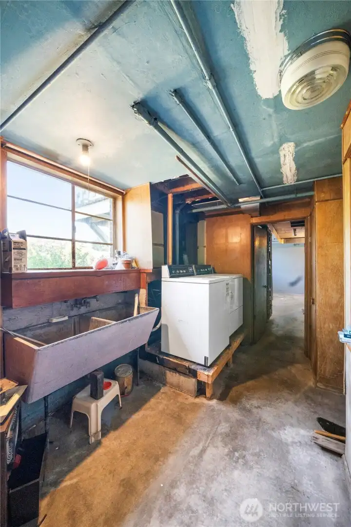 Laundry room can be relocated an dadd a nie large second bathroom downstiars with the 1/2 bath addition upstairs