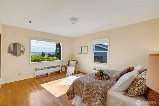 Primary bedroom with view.