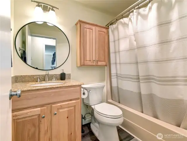 Main full bath, across the hall from the 2nd bedroom