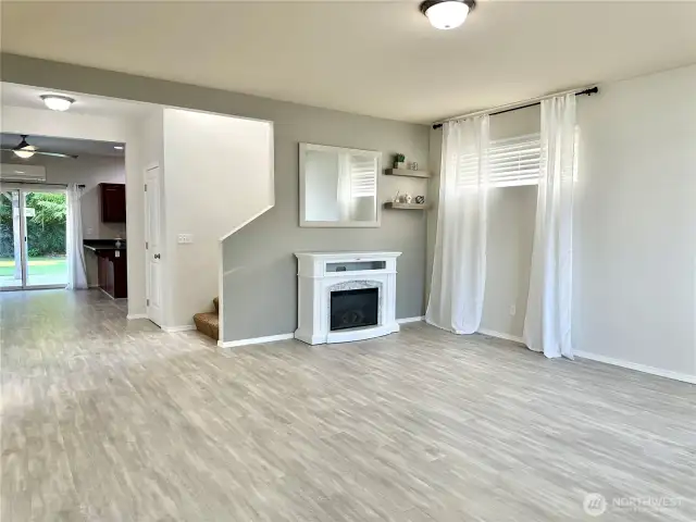 Entry way living/entertainment room, leaves plenty of room for socializing.