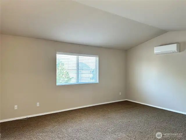 Vaulted Ceiling in primary adds to the open and grand feel of the home.