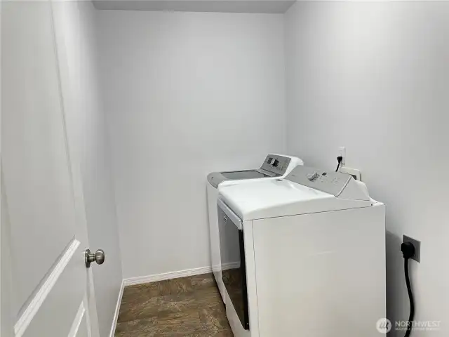 Laundry room. Big enough to add some shelves or storage above!